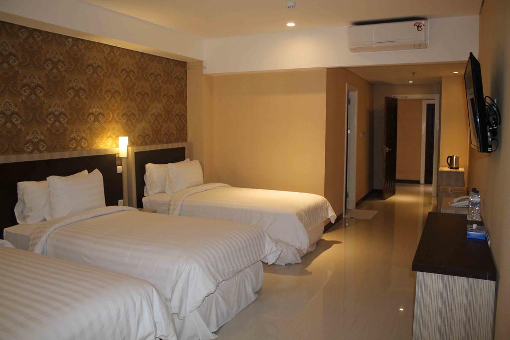 Sylvia Hotel Premier Kupang Zimmer foto